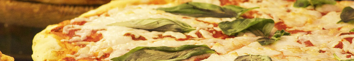 Eating Pizza at Dettore's Pizza restaurant in Monongahela, PA.
